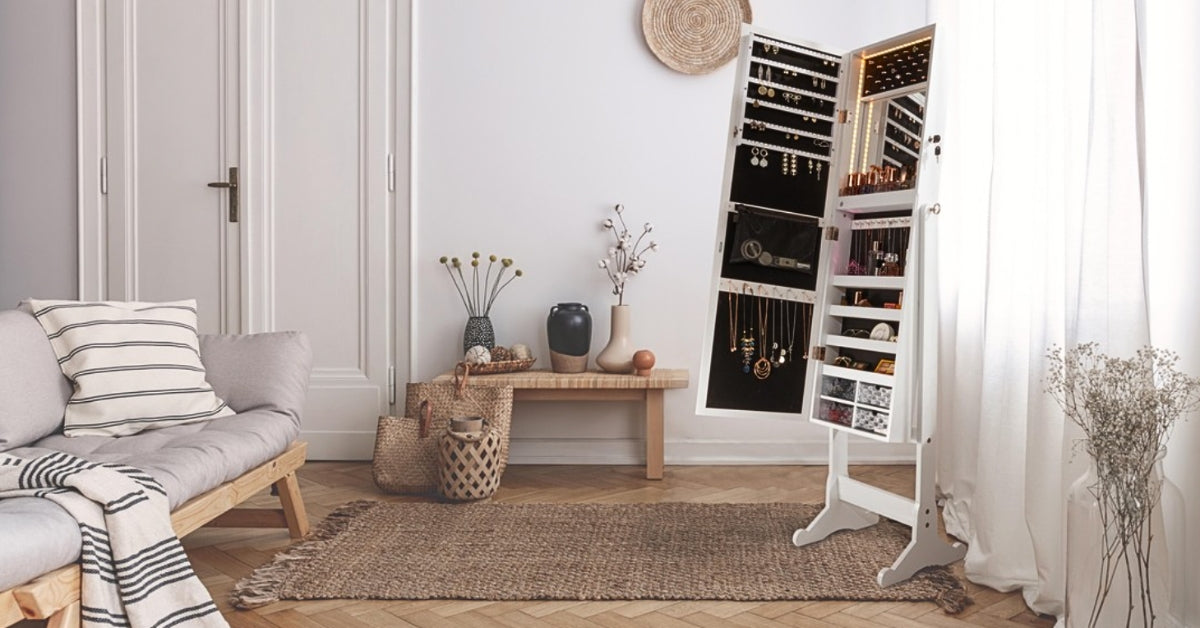 Perfect White Jewelry Armoire displayed in a living room