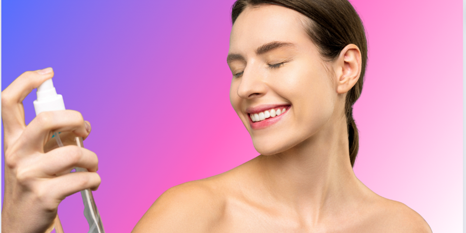 A beautiful woman using a setting spray for long lasting make-up.